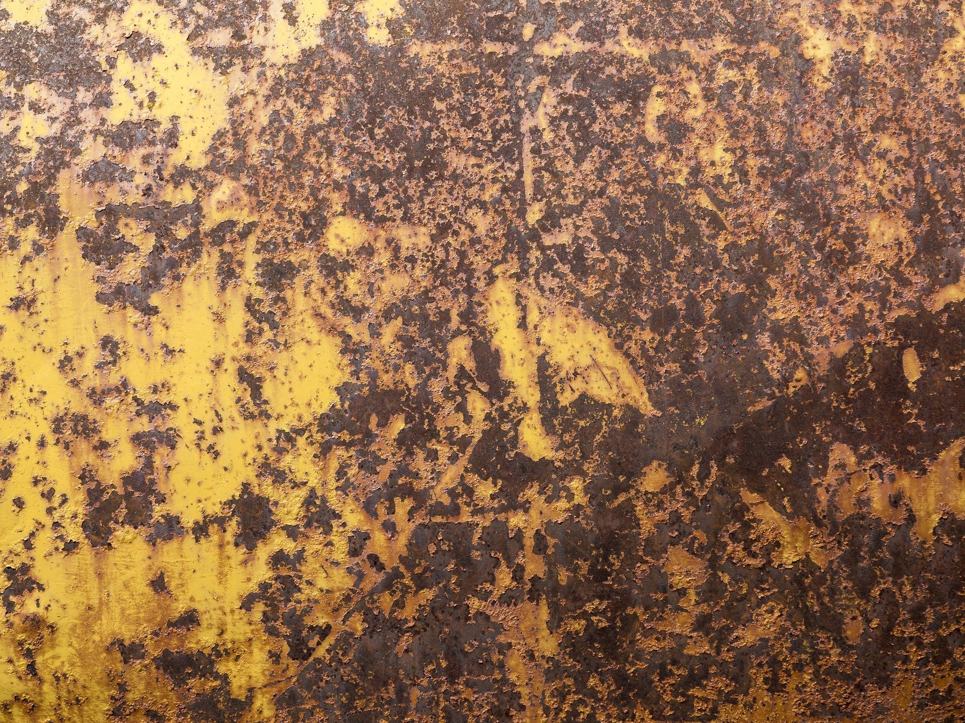 Yellow paint decays, iron rusts beneath the sun, metal turns to dust