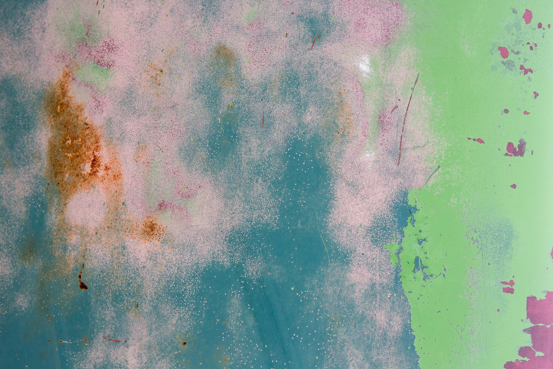 Blue fields meet the rust, orange veins bleed on the surface, time leaves a thick mark