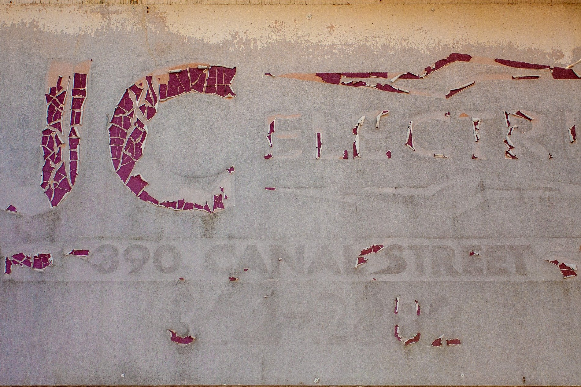 Blue mesh grid, fine synthetic fibers hold the pattern, light catches the weave