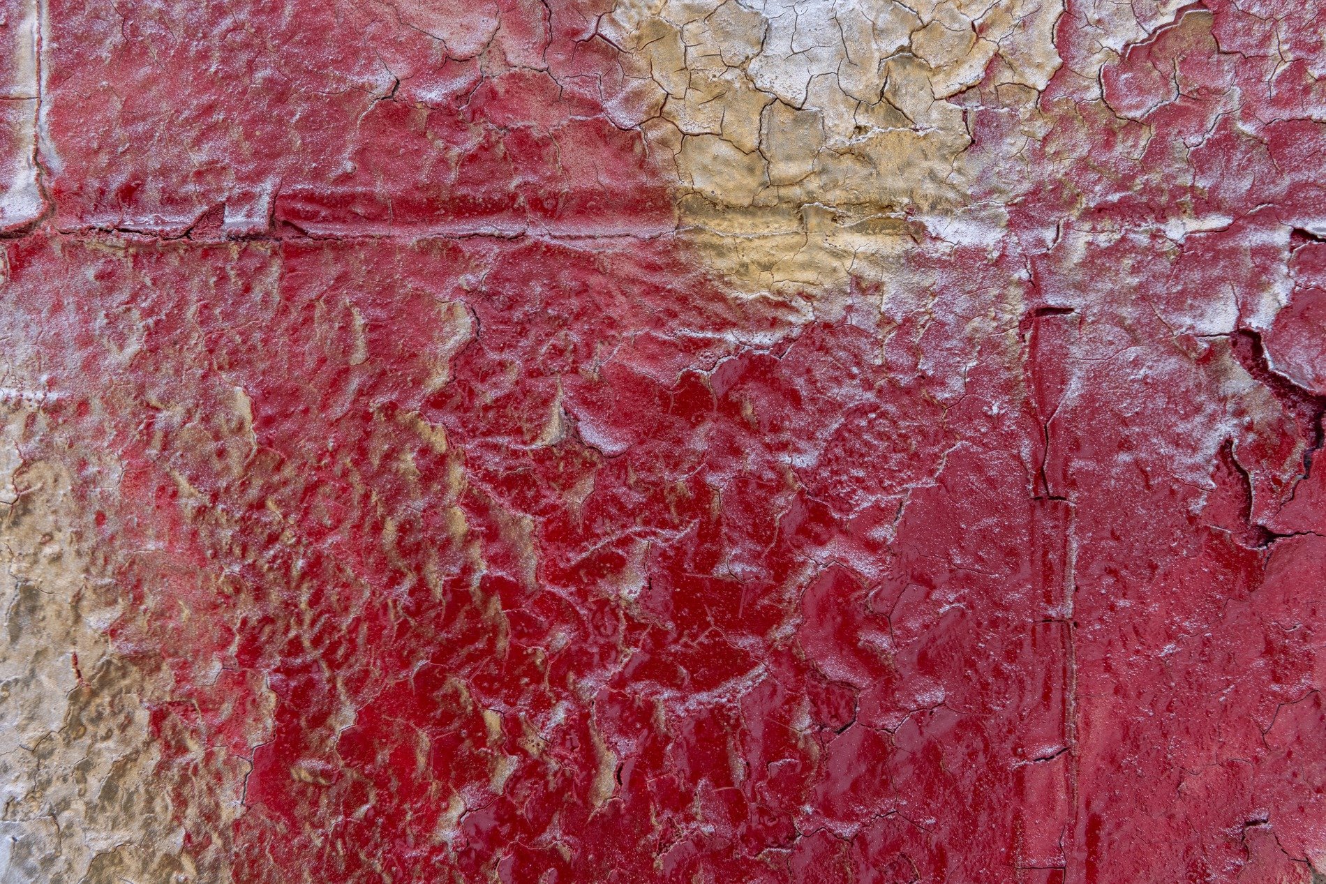 Blue spray on the grid, jagged letters meet the pattern, holes mark the field