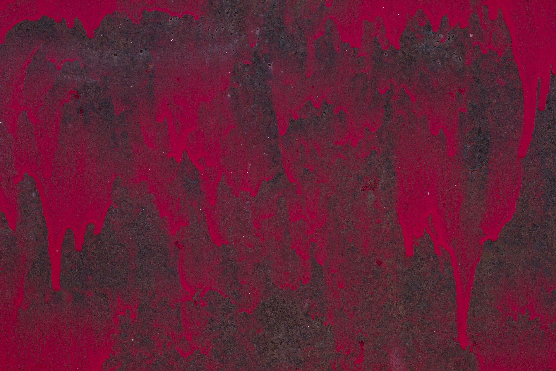 Red paint bleeds downward, iron surface turns to rust, time stains every mark