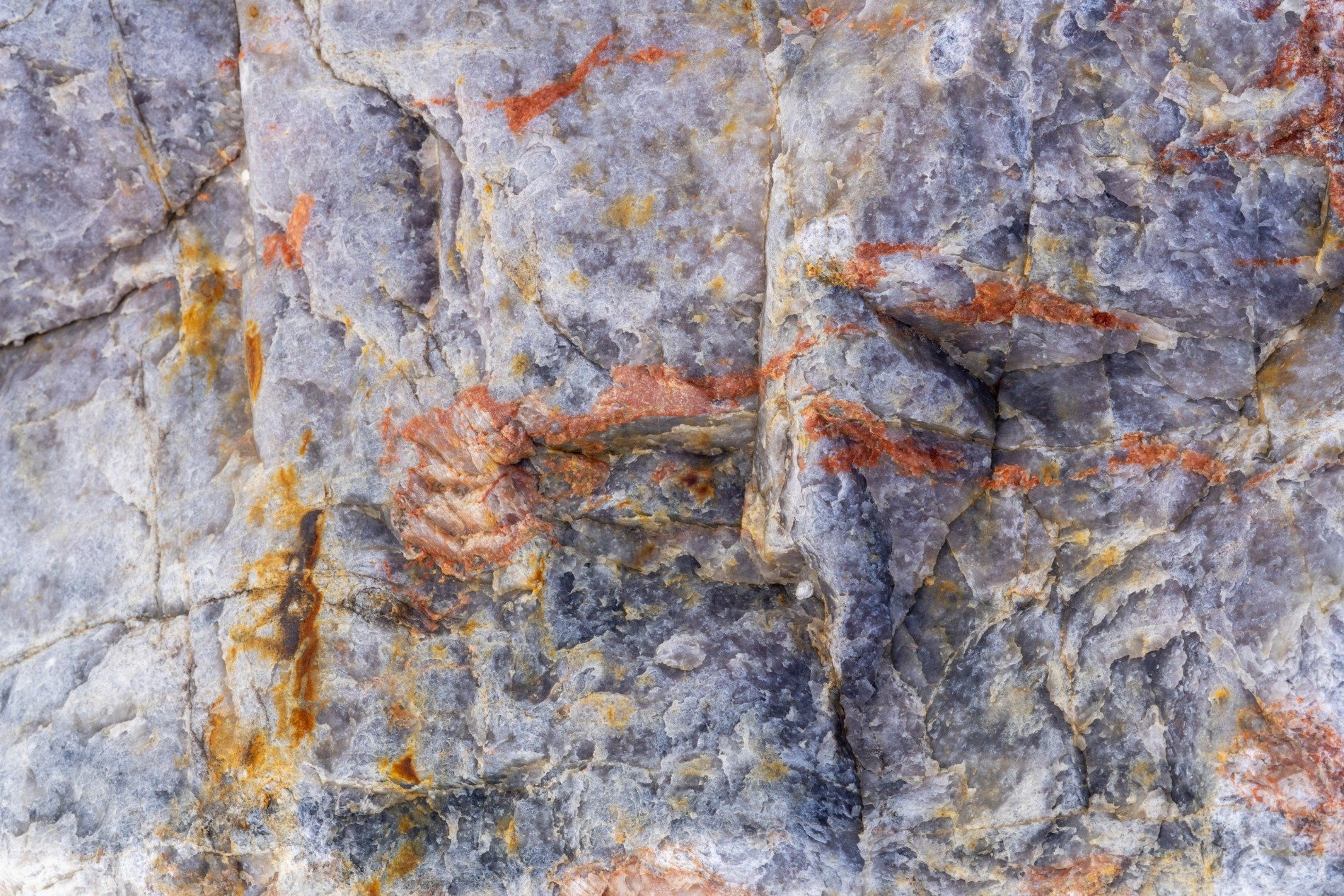 Purple crystal wall, orange rivers flow through stone, frozen time remains