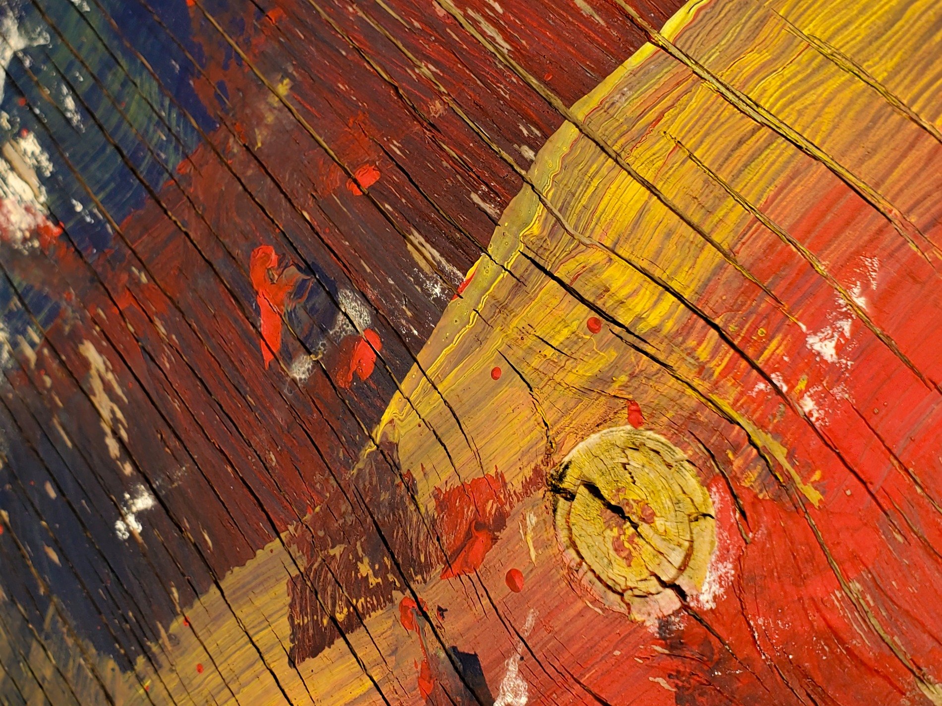 Red marks meet the blue, yellow spots scatter on top, time leaves a thick trace