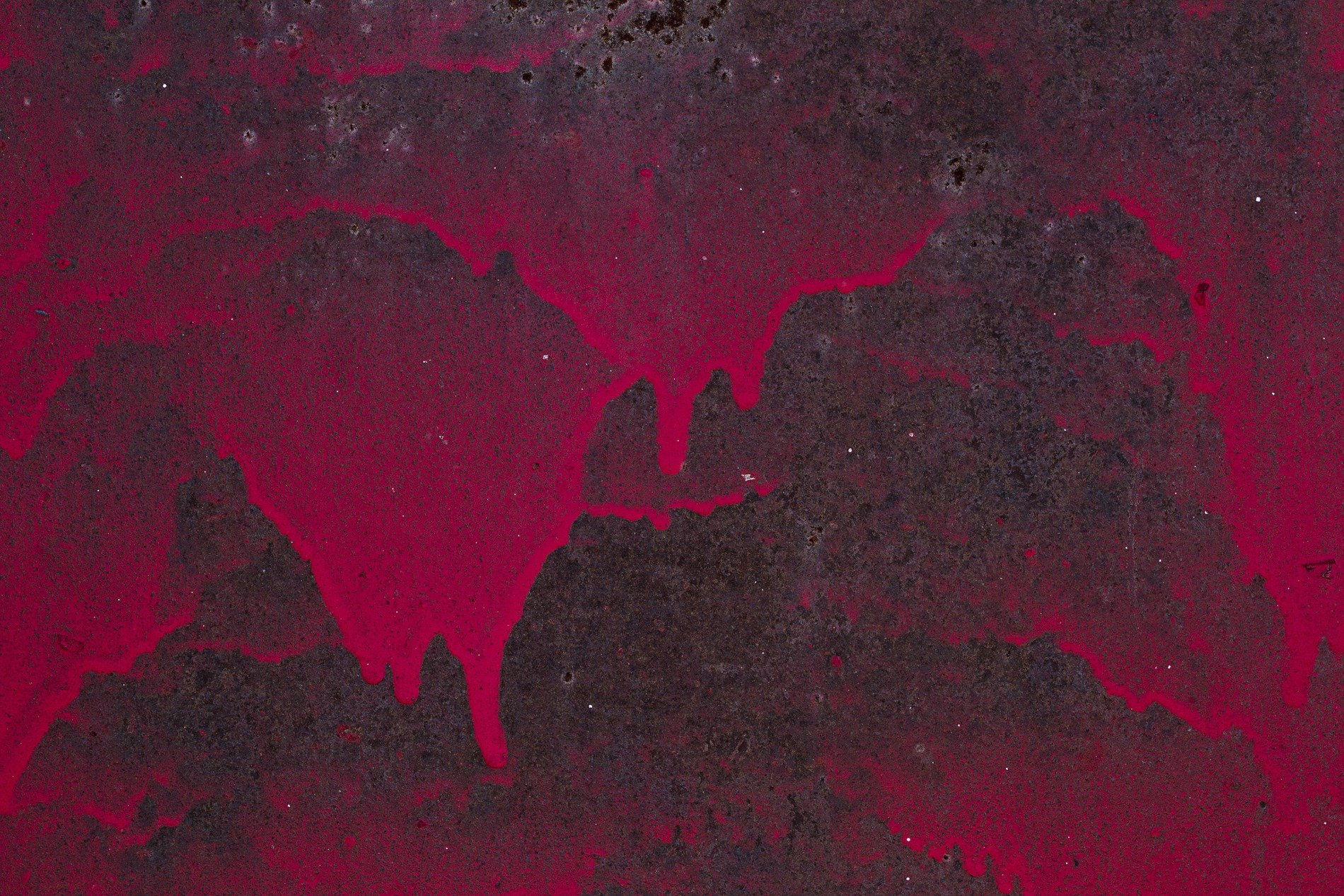 Red paint starts to run, rusted metal eats the edge, shadows bleed away