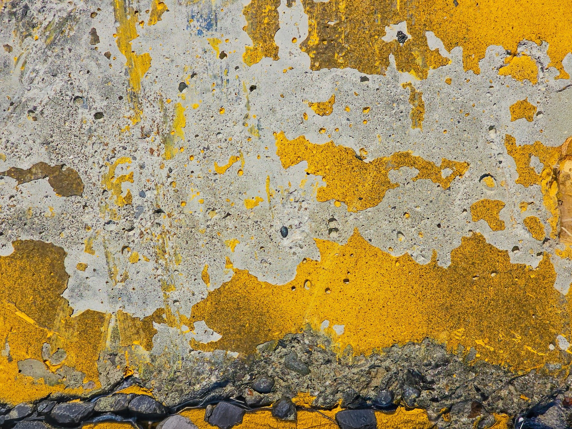 Red skin flakes away, weathered grain shows the years, old marks leave a trace