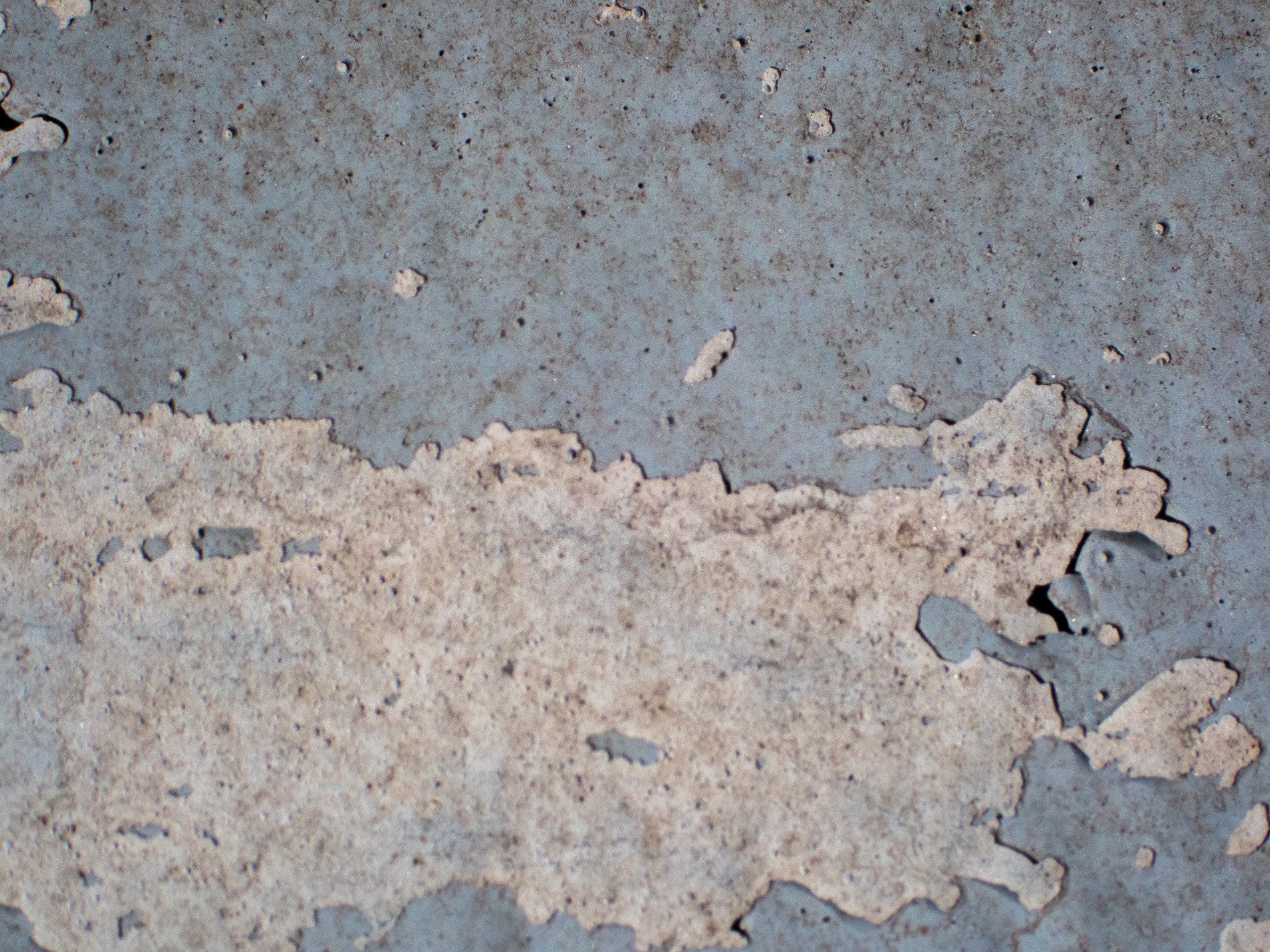 Silver grain flows through, grey lines trace the board, time wears the finish