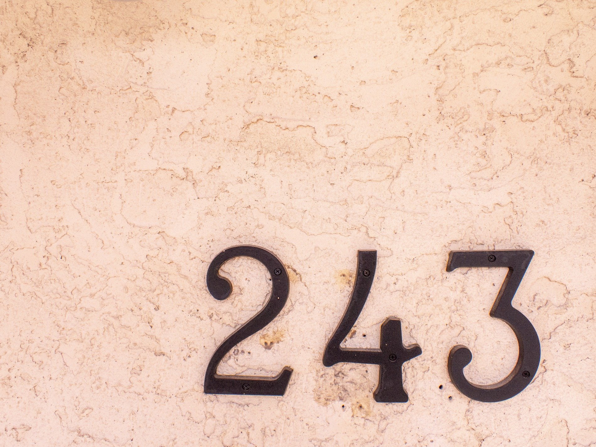 Silver wood holds the grain, grey lines trace the board, time wears the finish