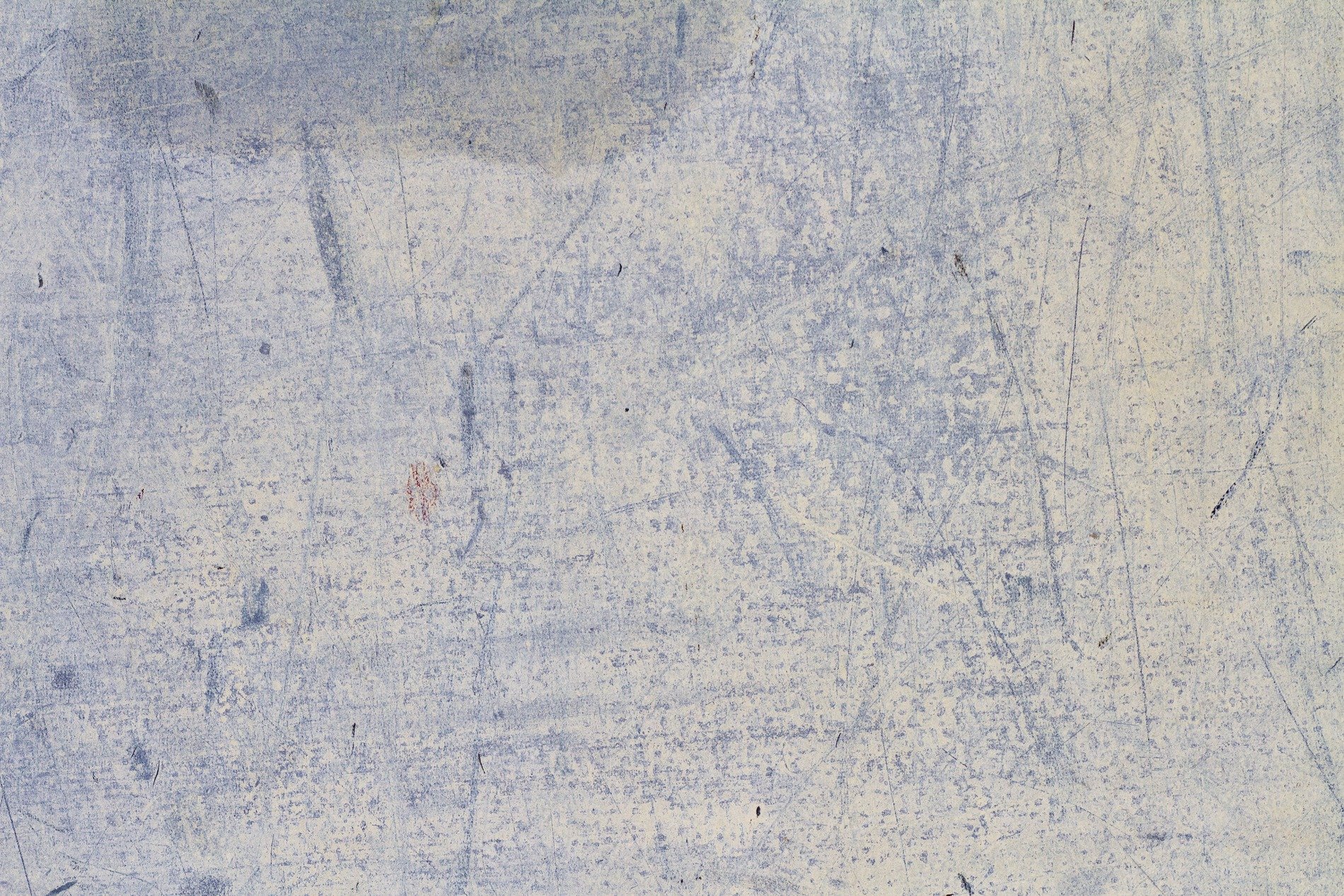 Pale blue wears away, fine lines cross the weathered face, ghosts of motion stay