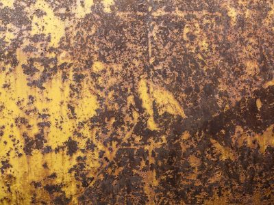 Yellow paint decays, iron rusts beneath the sun, metal turns to dust