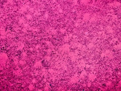 Bold magenta field, splattered grit on heavy wear, pink stains the metal.