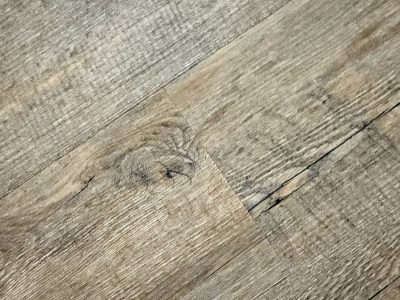 Grey stones in the mix, rough surface holds the grit, mineral flows deep