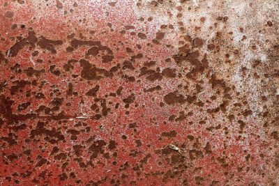 Orange mist flows deep, blue layers peel back to grey, decay takes the light