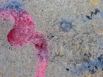 Pink mist meets the grey, jagged spots scatter on top, grit holds the splatter