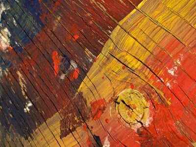 Red marks meet the blue, yellow spots scatter on top, time leaves a thick trace