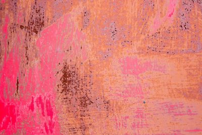 Red skin flakes away, orange mist claims all the depth, grit marks the decay