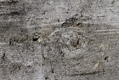 Red skin peels away, orange rust takes the heavy car steel, earth returns to grit