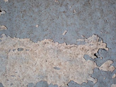 Silver grain flows through, grey lines trace the board, time wears the finish