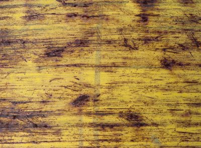 Yellow skin is torn, oxidation takes its hold, iron shows its age