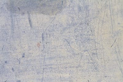 Pale blue wears away, fine lines cross the weathered face, ghosts of motion stay