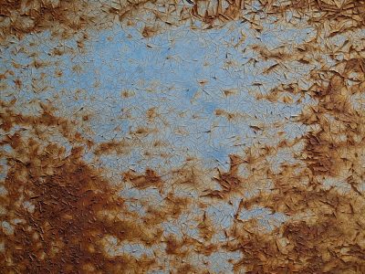 Teal skin meets the rust, orange veins bleed on the blue, grit marks the finish