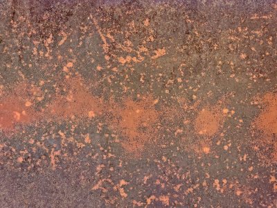 Teal skin turns to gold, orange rust blooms on blue, steel wears thin and old