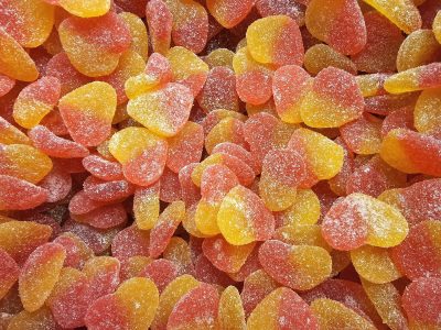 White drifts hold the light, blue shadows carve the frozen field, cold claims the earth