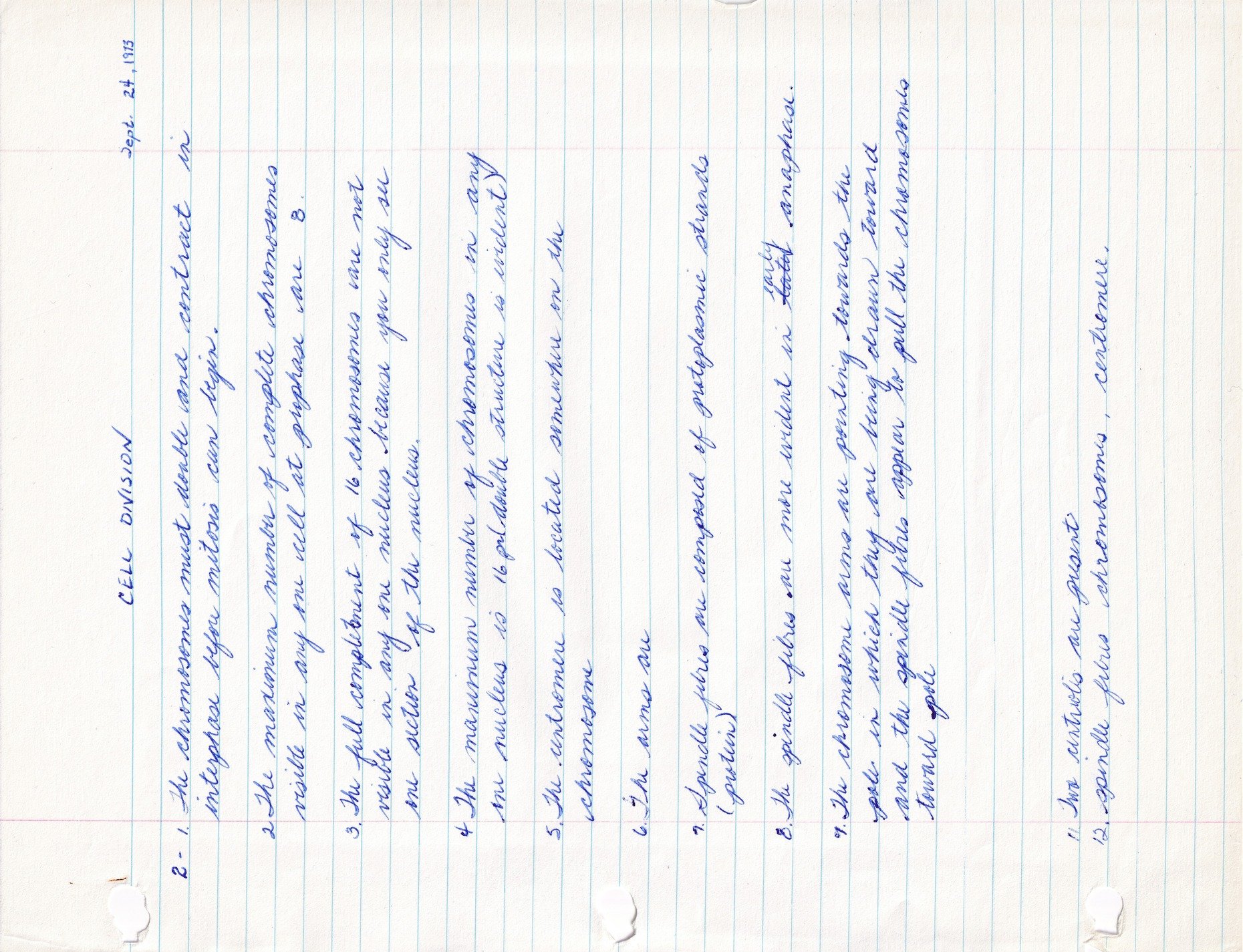 Blue ink cursive flow, cell division notes remain, faded paper lines