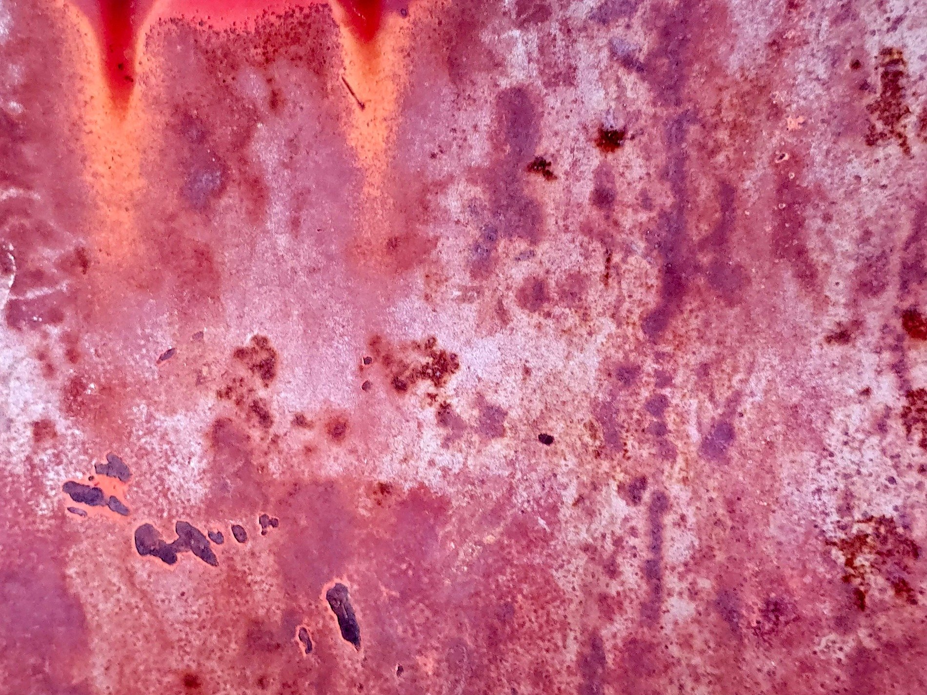 Blue skin has light marks, jagged scars trace the heavy, grit marks the finish