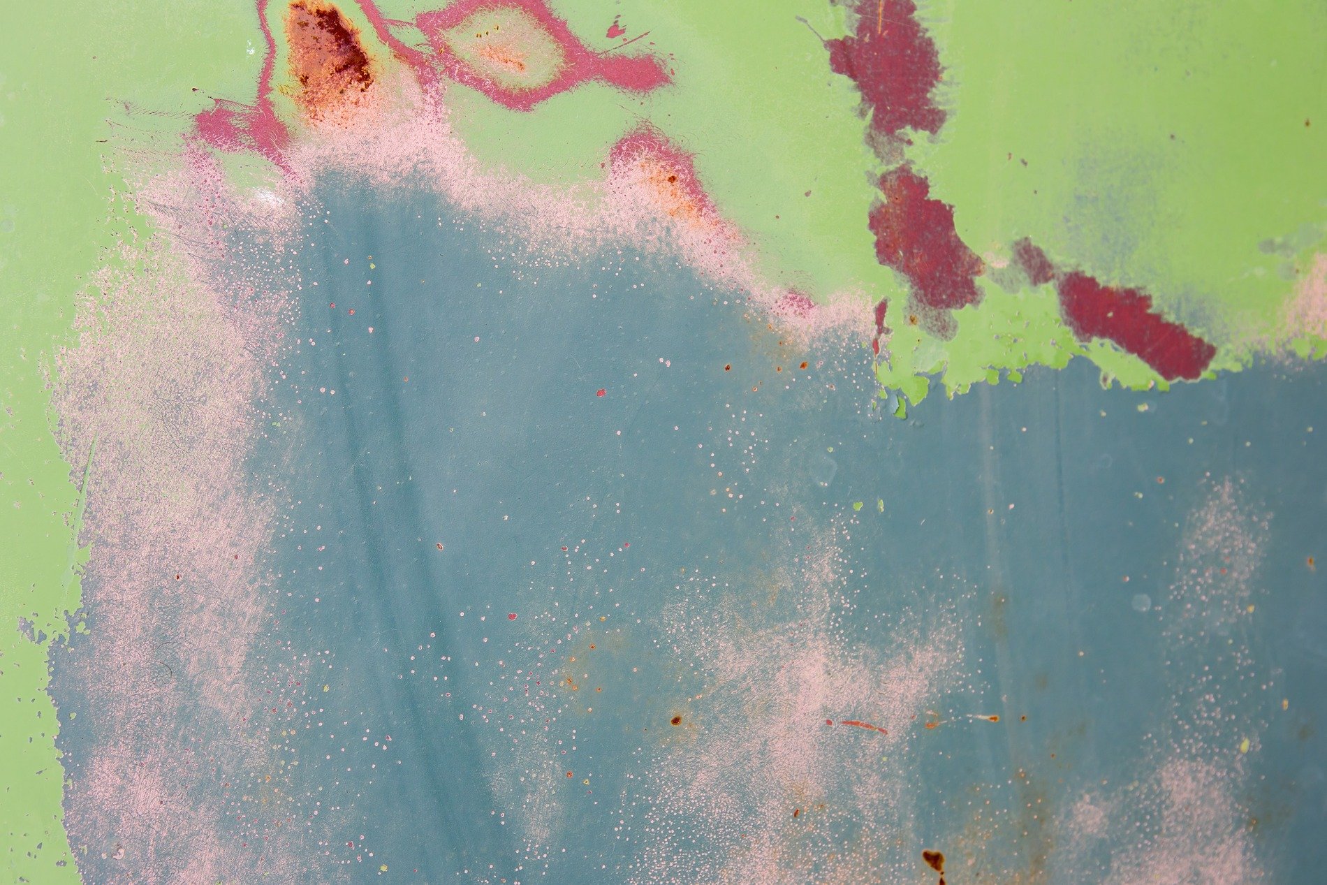 Blue skin has white marks, jagged lines divide the field, grit holds the pattern