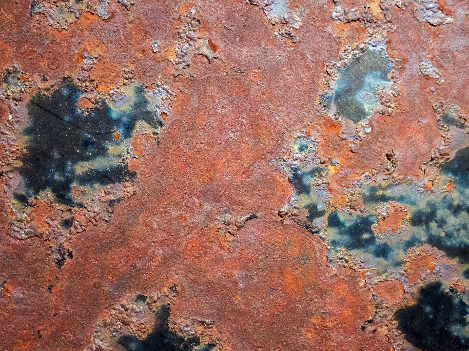 Blue skin meets the light, orange spots claim the heavy, grit marks the finish