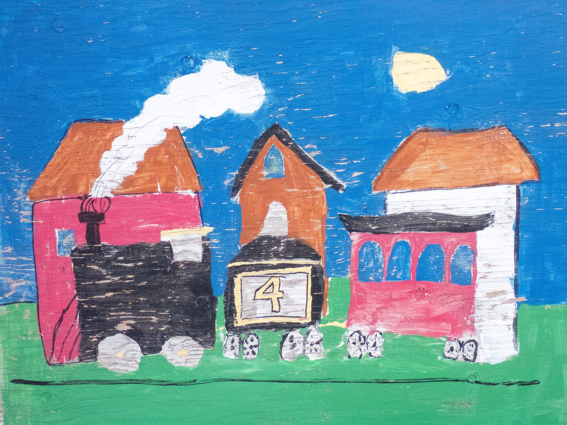 Blue swirls meet the grain, faded art holds the timber, time marks the fiber