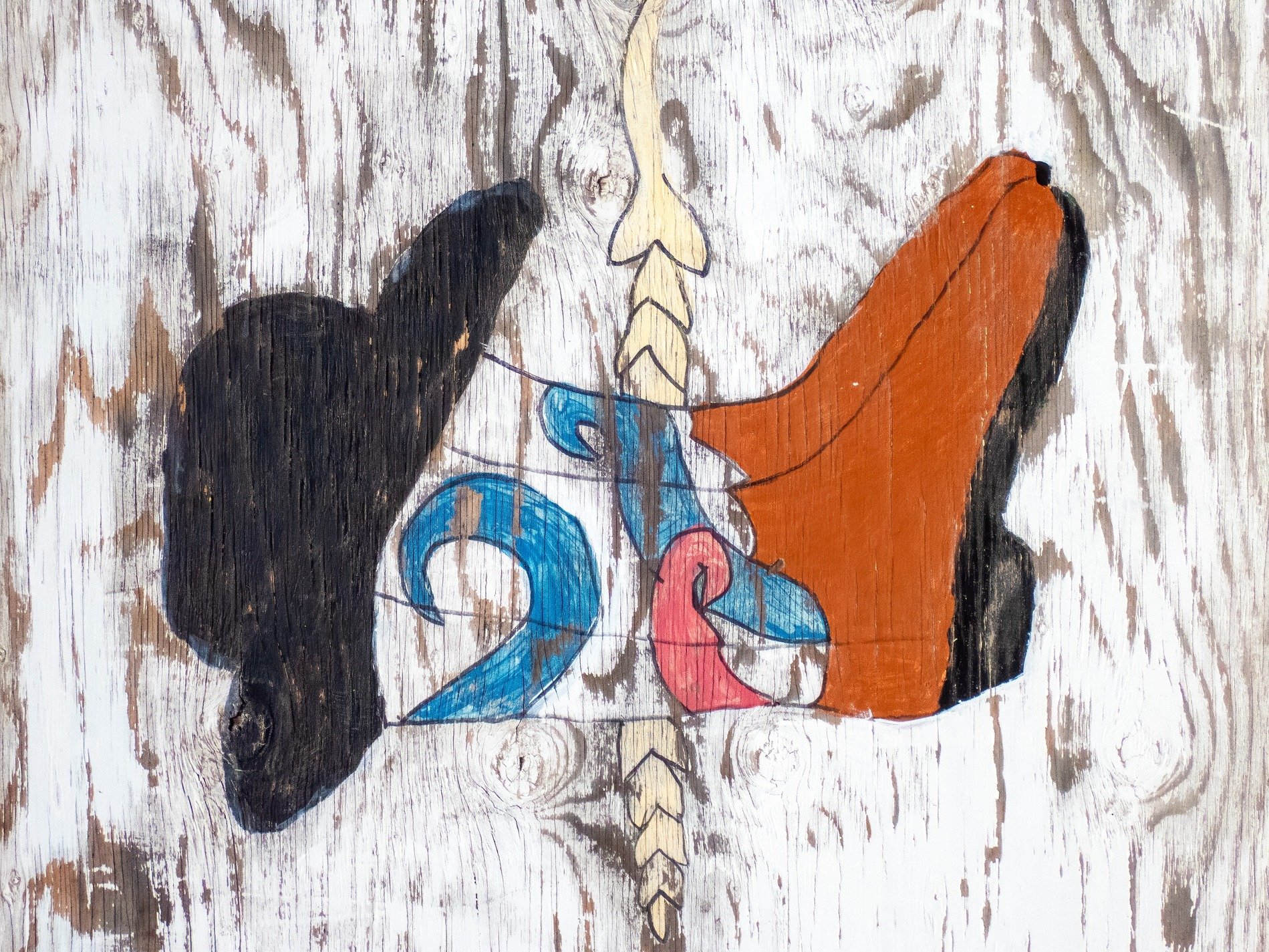 Boot and grain unite, faded paths trace the heavy, time marks the wood art