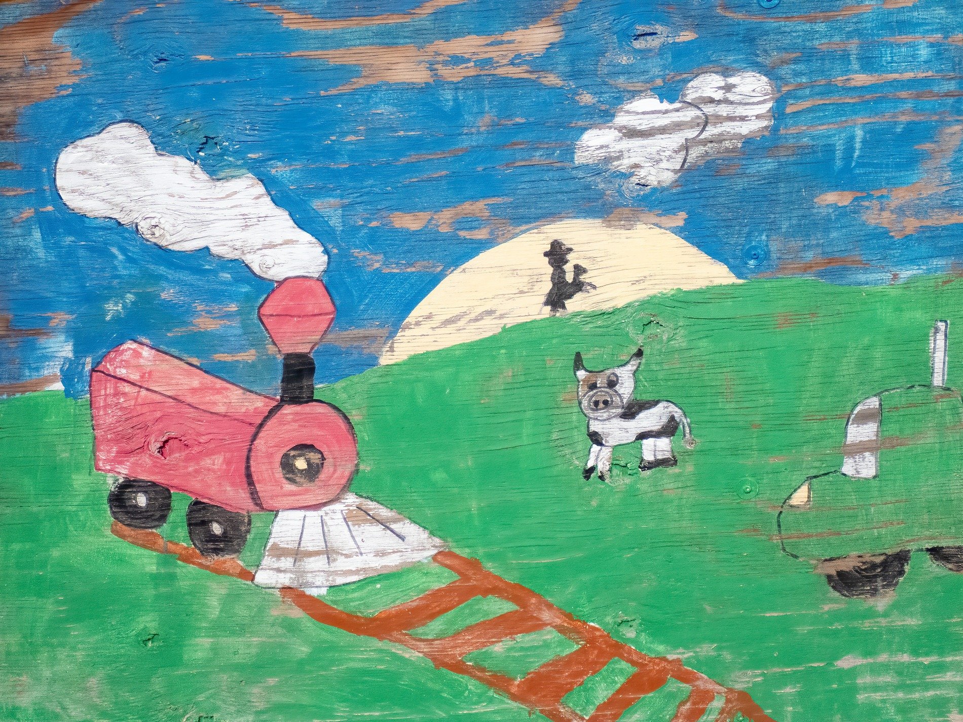 Colors trace the train, bright scenes meet the wood grain, light marks the scene