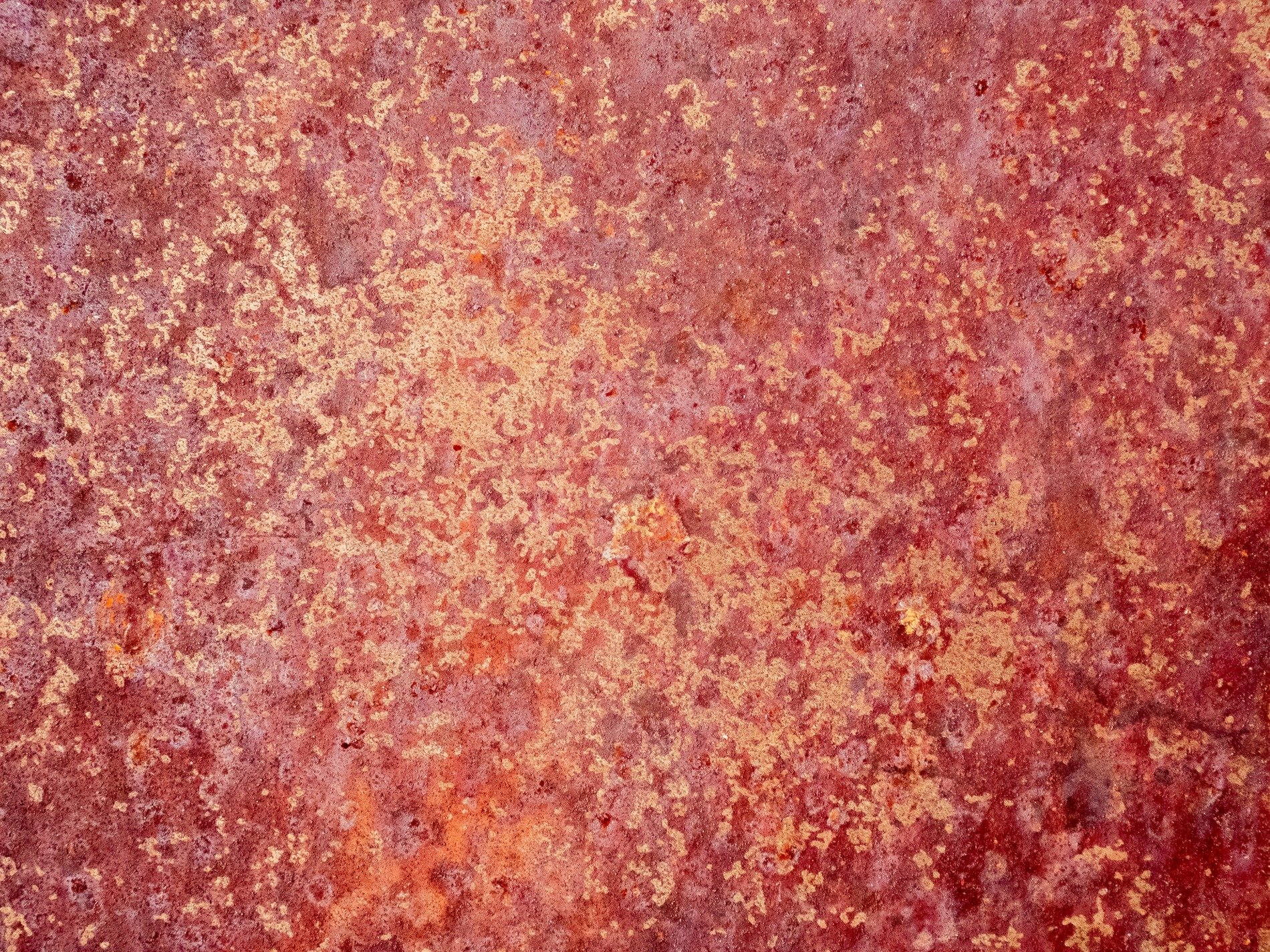 Dark grain holds the light, jagged marks scatter on top, grit marks the finish