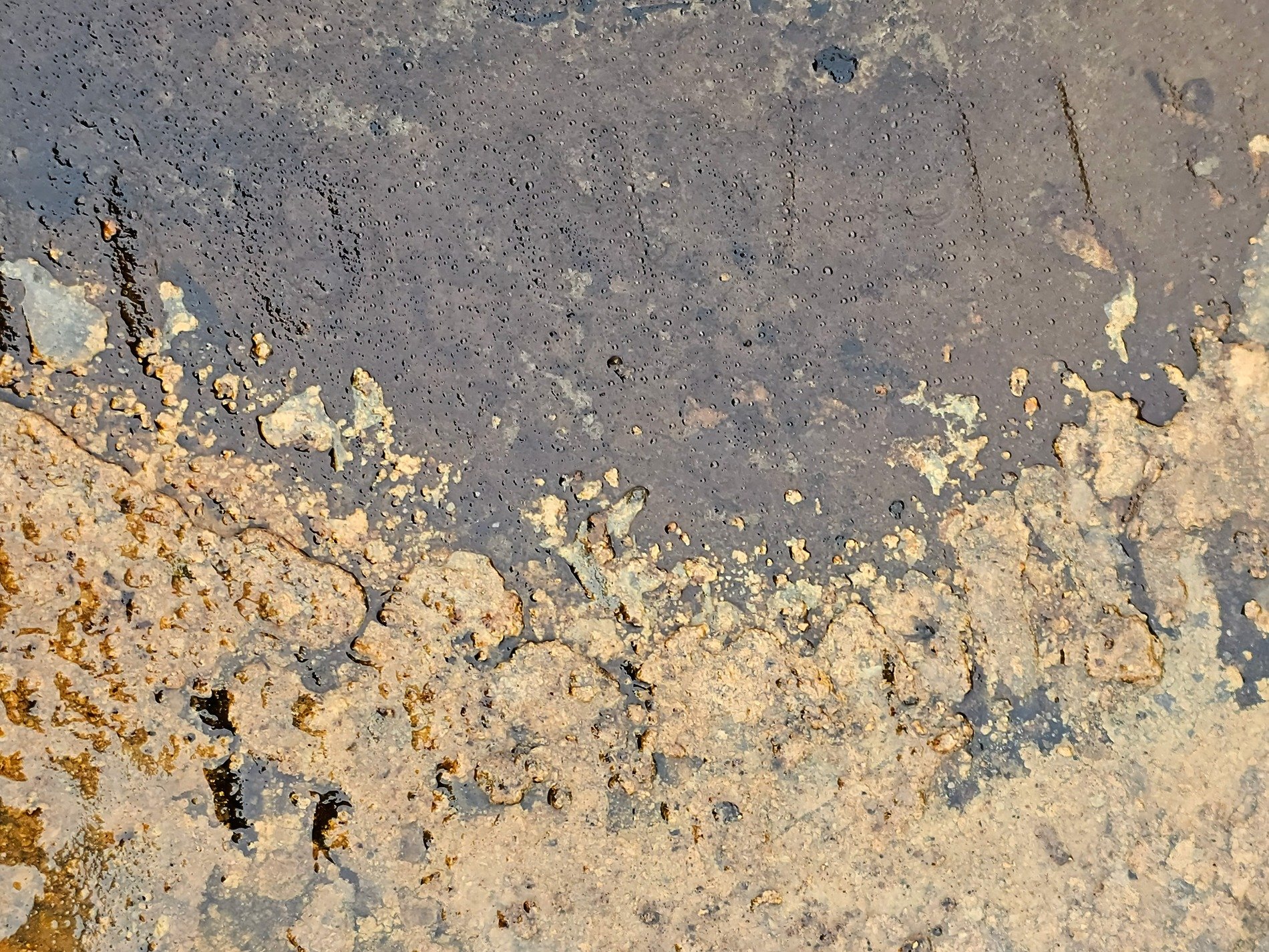 Dark waves flow so thick, heavy grit claims the metal, years leave a deep mark