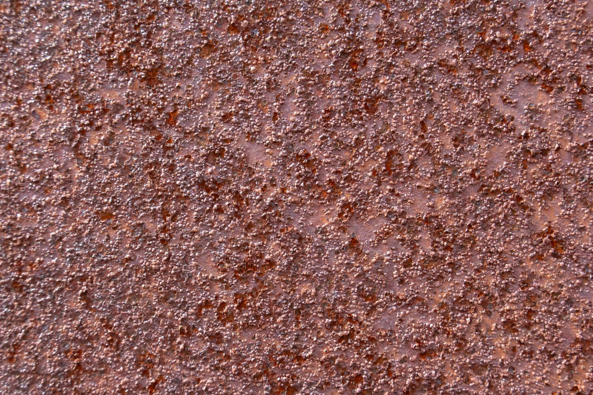 Dark waves flow thick, orange grit claims the surface, time leaves a deep mark