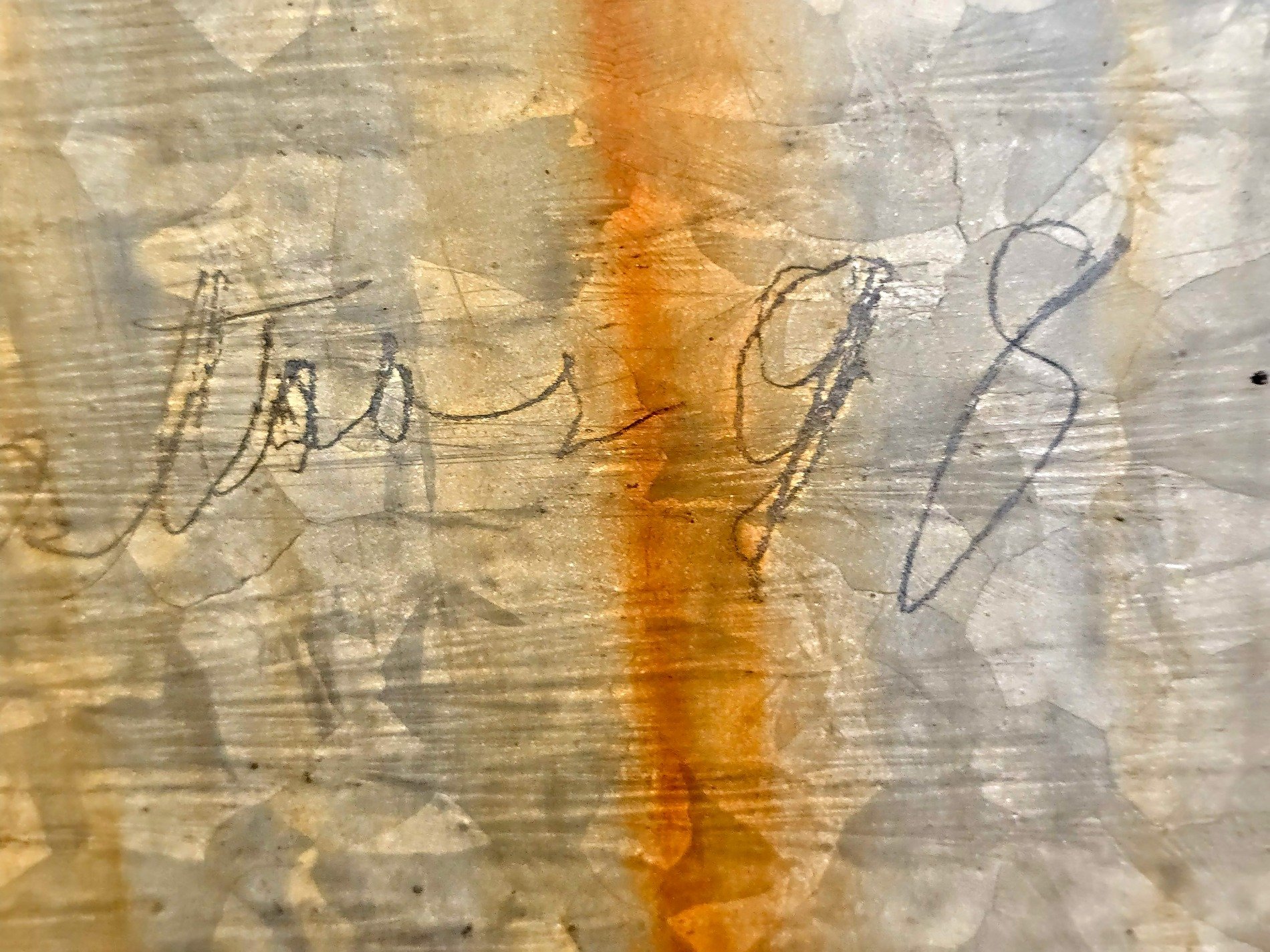 Ink on cold grey steel, orange streak of oxidation, echoes of the past