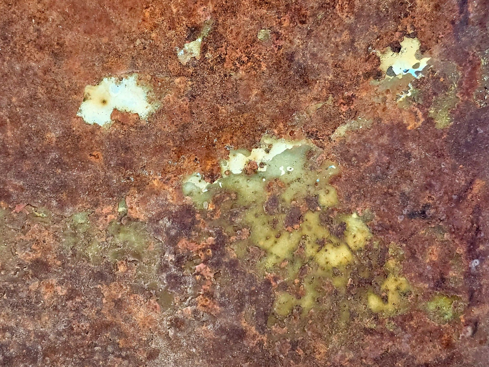 Orange grit claims all, jagged pits mark the heavy, rust turns to the dust