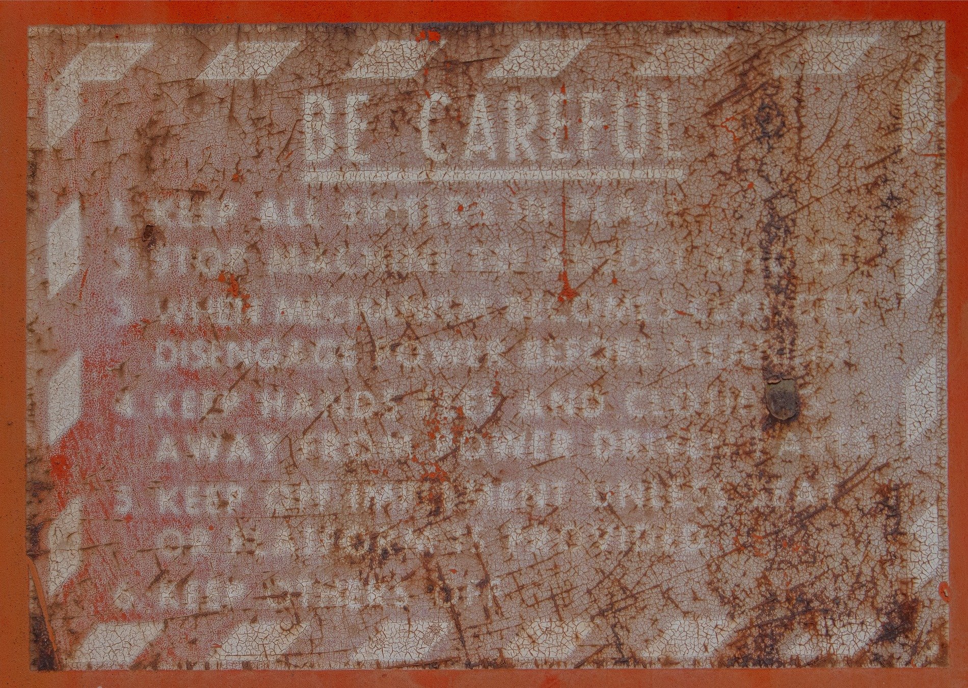 Orange skin turns to grit, jagged warnings meet the light, old paths show the way