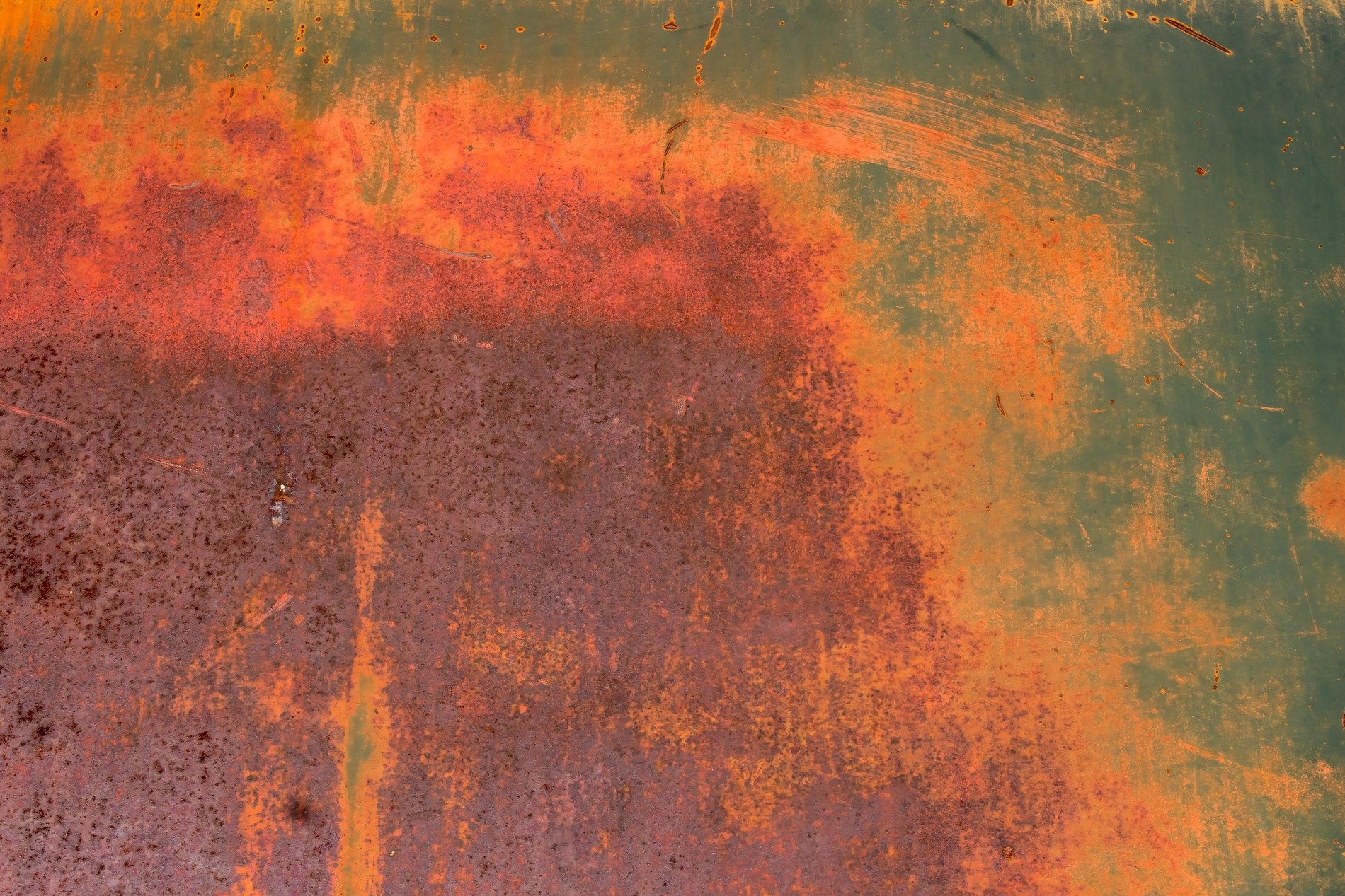 Oxide blooms in fire, iron yields to moisture's touch, silent red decay