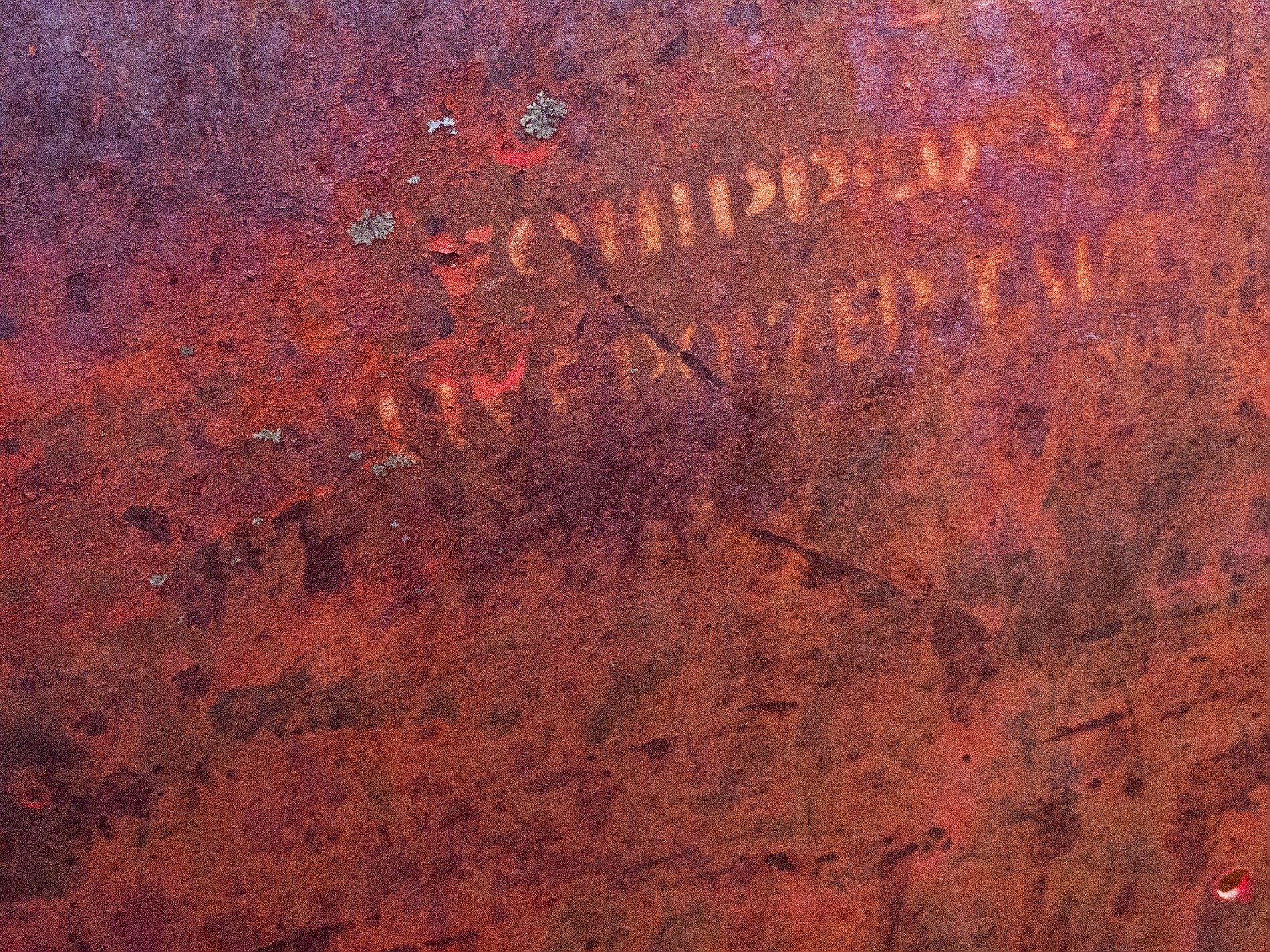 Pink fields meet the rust, heavy grit claims the surface, time leaves a deep mark