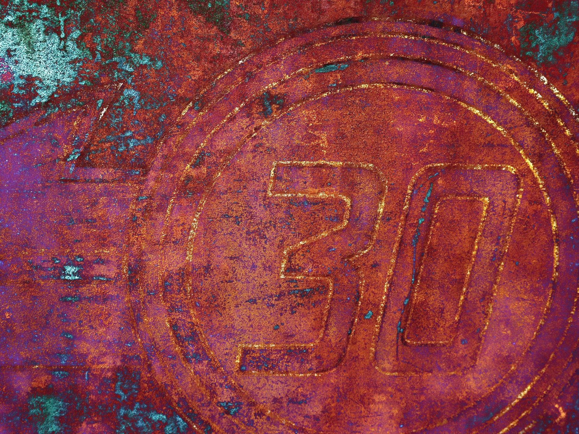 Thirty etched in steel, teal and orange start to bleed, metal marks the time