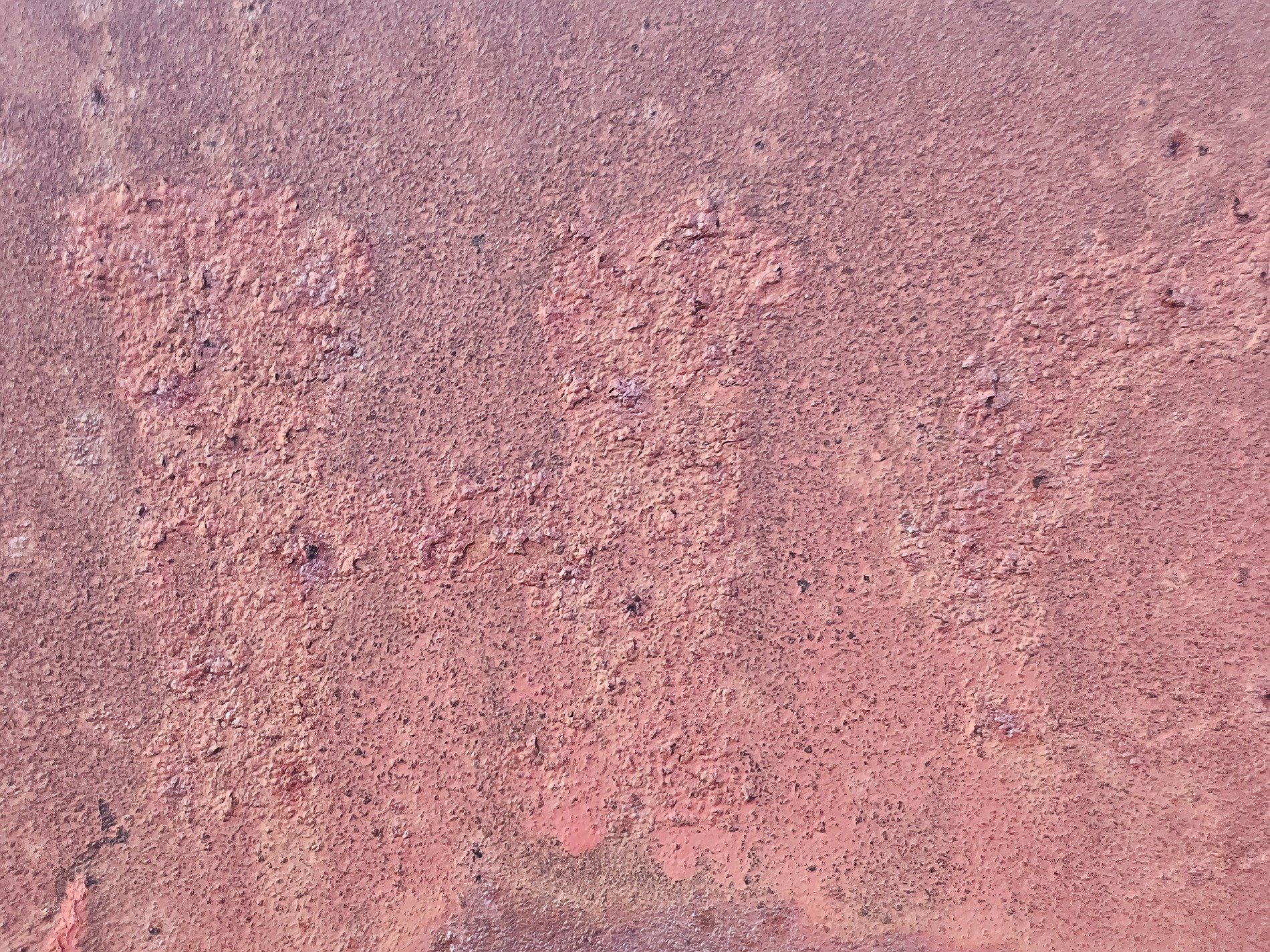 Red dust coats the iron, rough scales form on metal skin, age eats through the core