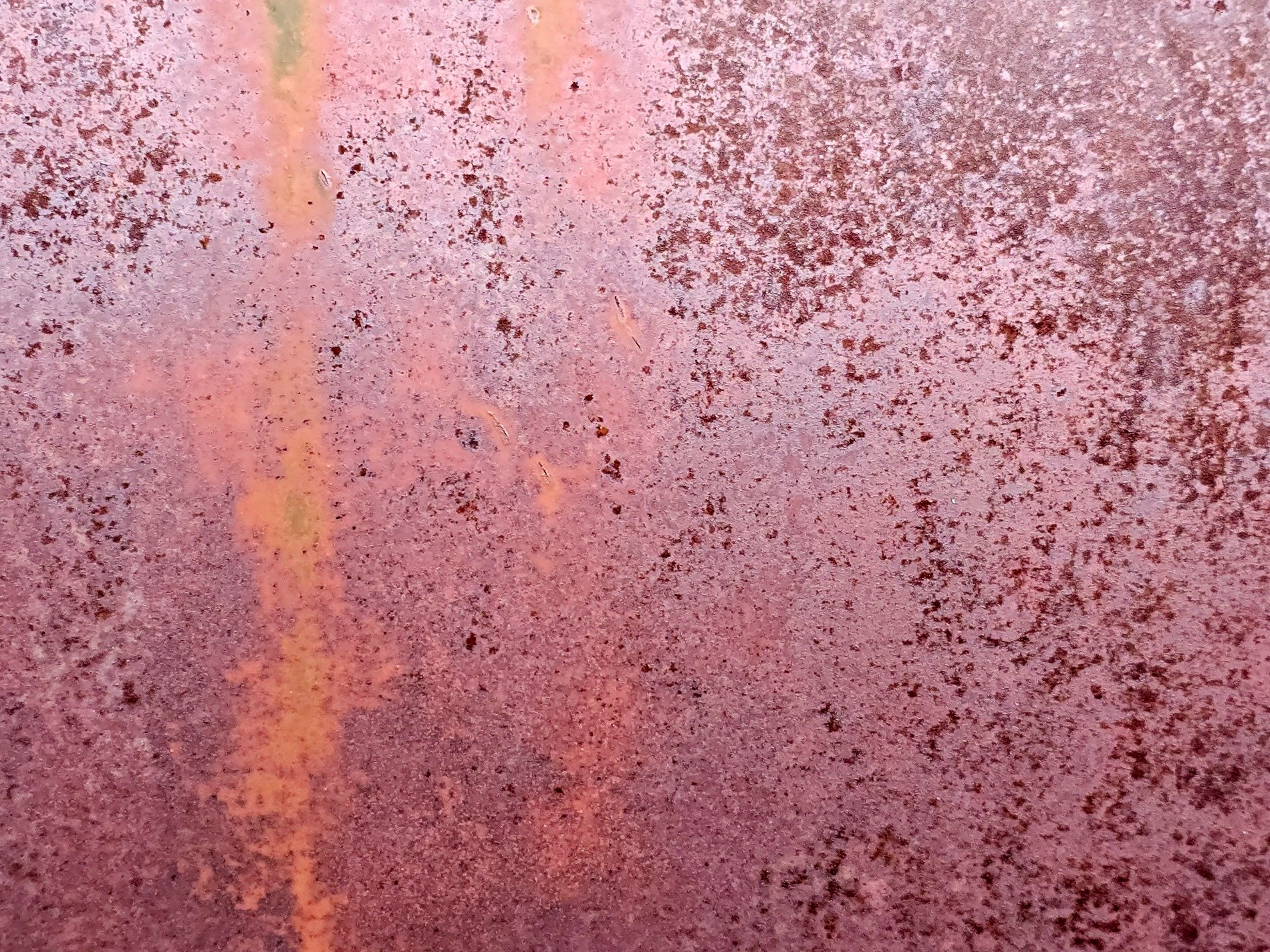 Red dust starts to bloom, copper stains the cold hard steel, iron fades to earth