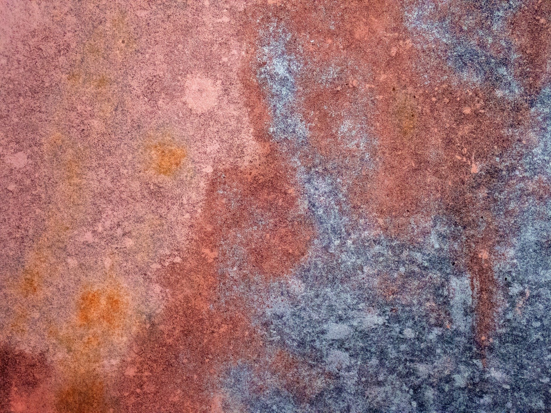 Red fields meet the light, orange grit claims the heavy, time leaves a deep mark