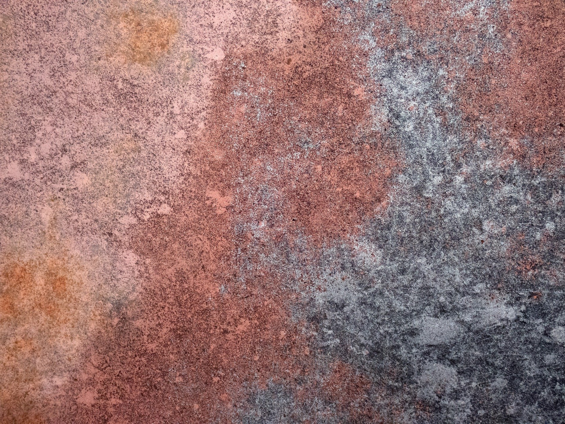 Red skin yields to orange grit, jagged paths trace the heavy, time marks the metal