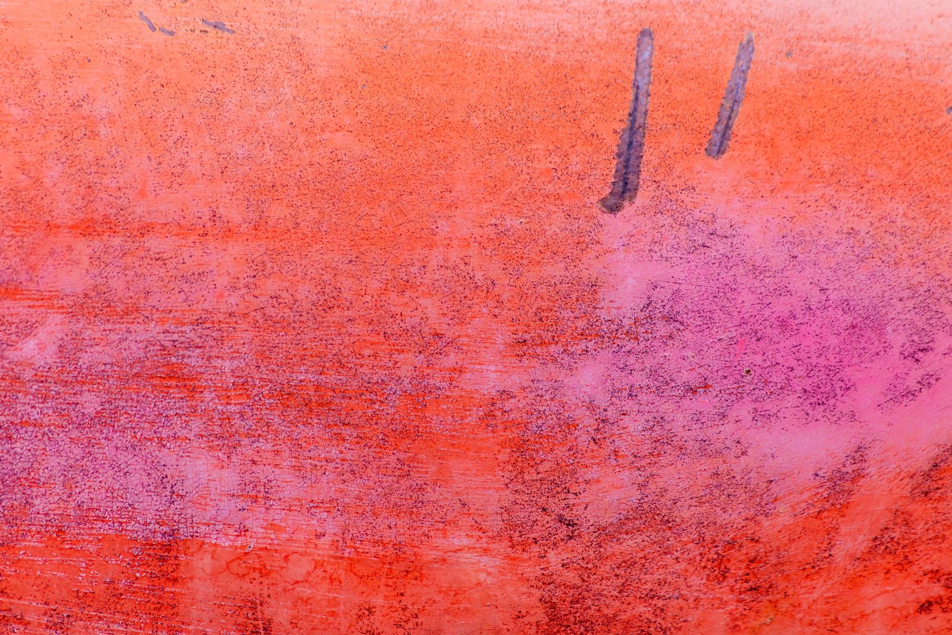 Silver skin has light marks, jagged scars trace the heavy, grit marks the finish