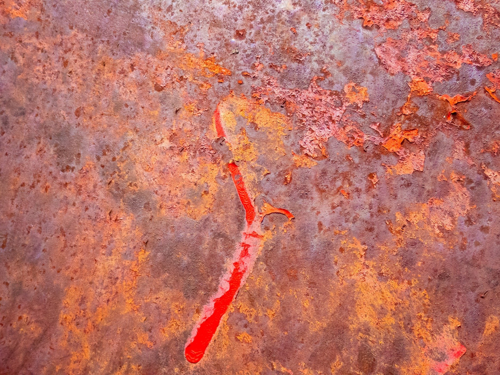 Steel plate turns to dust, crimson mark bleeds through the rust, flaking metal skin