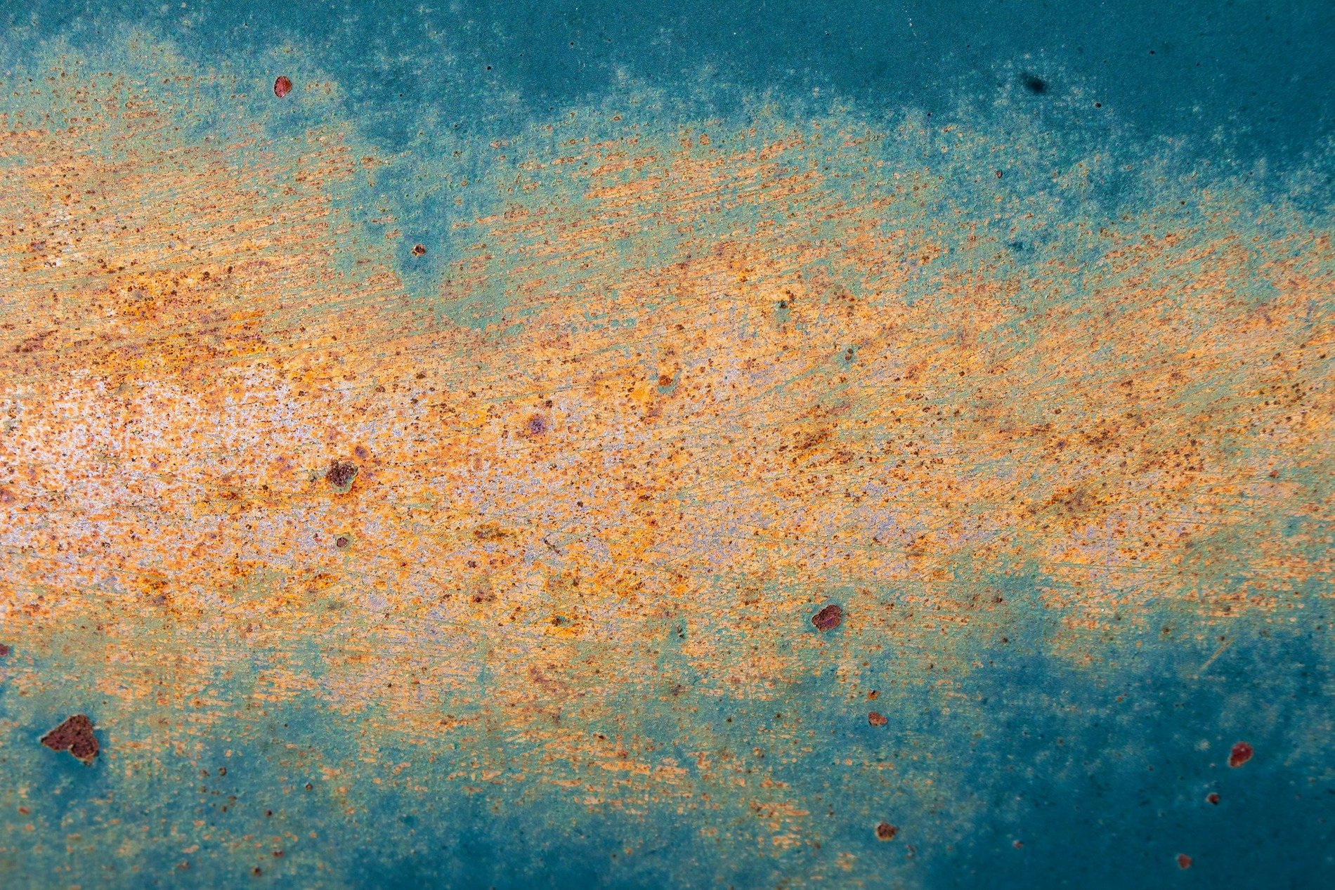 Teal fields meet the rust, orange paths trace the heavy, light marks the finish