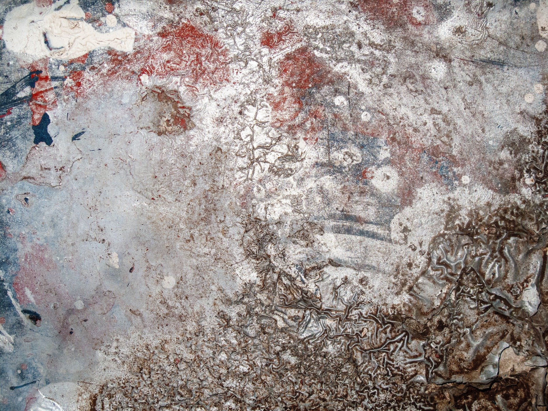 Teal skin meets the rust, orange waves bleed on the metal, time carves the finish